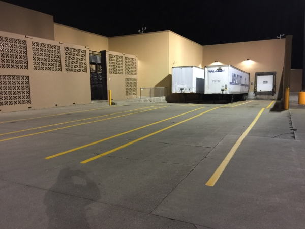 Evening shot of long stripes outside of warehouse